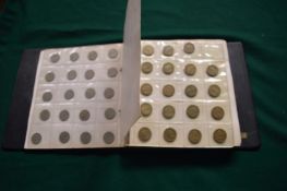 Coin album containing 300 various coins.