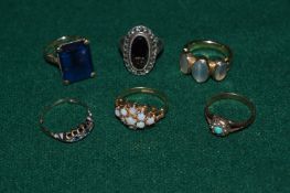 Six decorative rings.