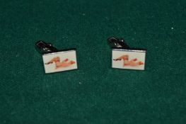 A pair of cufflinks.