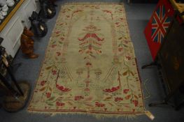 A 19/20th century Turkish rug, 210cm x 118cm.