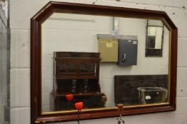 A modern overmantle mirror.