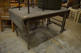 Oka, a Cythera extendable dining table in distressed grey pine finish (retail price £1495).