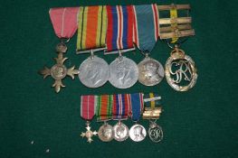 A good group of WWII medals and miniature medals, unnamed to include MBE, The Defence Medal, Victory