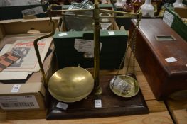 Brass weighing scales.
