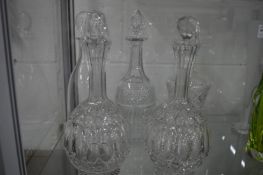 Five various decanters.