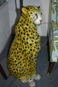 A good large pottery model of a cheetah.