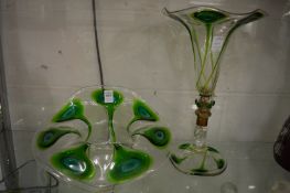 A stylish moulded glass bowl with green and blue 'Peacock tail' style decoration together with a