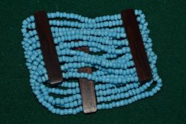 Turquoise bead cuff bracelet.