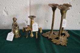 Cast bronze triple candlestick, another bronze item and a brass figurine.