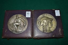 Two Olympic medallions with original cases, one engraved for 1949.