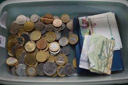 Various coins and bank notes.