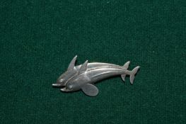 A Georg Jensen silver dolphin brooch.
