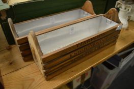 A pair of novelty plant troughs.