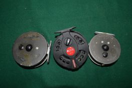 Two Hardy fly fishing reels, Marquis no 7 and Marquis no 10 together with another reel.