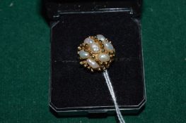 A 9ct gold and pearl cluster ring.