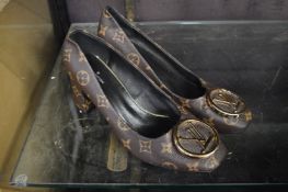 A pair of ladies Louis Vuitton shoes, size 6½.