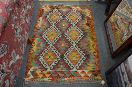 A good small colourful Kilim rug, 130cm x 82cm.