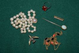 A pearl necklace with 18ct gold clasp and other items of jewellery.
