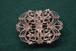 A nurses belt buckle.