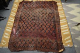 A Persian rug, badly worn, 160cm x 115cm.