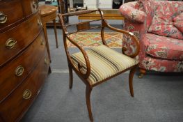 A set of six Regency style brass inlaid mahogany stained dining chairs, two with arms.