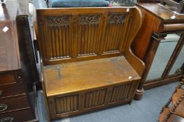 Gothic Revival oak hall seat.