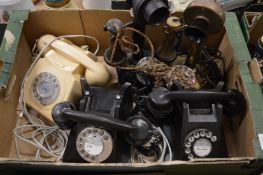 A collection of old telephones.