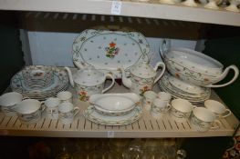 A quantity of Limoge floral decorated dinnerware.