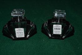 A pair of miniature Art Deco style scent bottles.