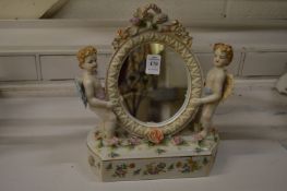 A Dresden style porcelain dressing table mirror.
