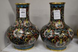 A pair of cloisonne bottle vases.