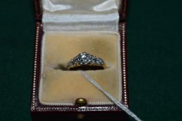 An 18ct gold, platinum and diamond ring with original purchase certificate, dated 1961.