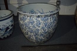 A large modern Chinese blue and white fish bowl.