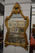 Decorative gilt framed mirror.