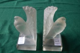 A pair of frosted glass love bird bookends.