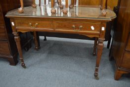 A good 19th century mahogany two drawer table with rounded ends.