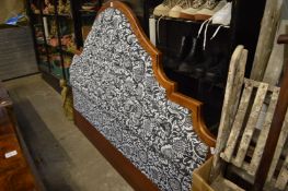 A very large upholstered headboard, 6ft 10