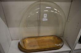 A large glass dome on stand, dome size 46cm high, 52cm wide, 21cm deep.
