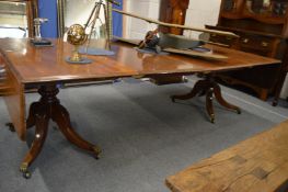 A good large 19th century mahogany twin pillar extending dining table with two leaves and drop-