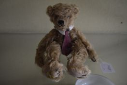 A Merrythought limited edition teddy bear.