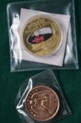 Two Commemorative coins comprising a William and Kate crown and a replica Wellington crown.