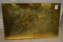 A Japanese rectangular brass tray with engraved decoration.
