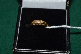 An 18ct gold and diamond ring.