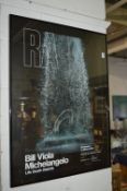 Two exhibition posters, Ai Weiwei and Bill Viola, framed and glazed.