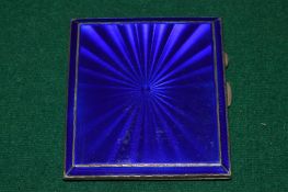 A silver and enamel cigarette case (minor ware and scratches to enamel otherwise good condition).