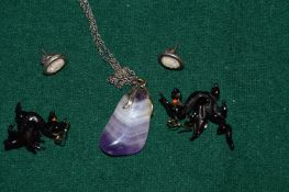 Two pairs of earrings and an agate pendant and chain.