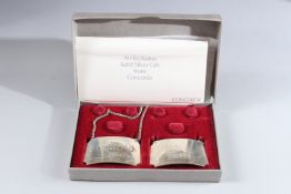 A PAIR OF SILVER CONCORDE BOXED BOTTLE LABELS. BOURBON AND RYE.
