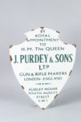 AN ENAMEL SIGN 'J. PURDEY & SONS LTD'. 45cms x 34cms.