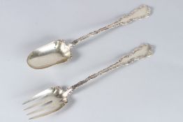 A STERLING SILVER SPOON AND FORK.