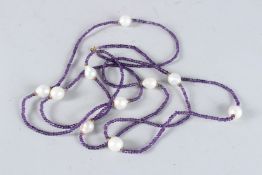AN AMETHYST AND BAROQUE PEARL ROPE NECKLACE.